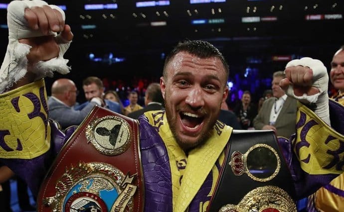 Ломаченко выиграл у британца Кролла и защитил чемпионские титулы - рис. 2