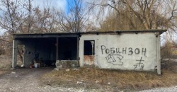 В одном из районов Днепра местные жители утепляли дом для «робинзонов» - рис. 9