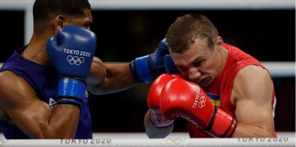 Боксер Александр Хижняк взял "серебро" на Олимпиаде в Токио - рис. 1