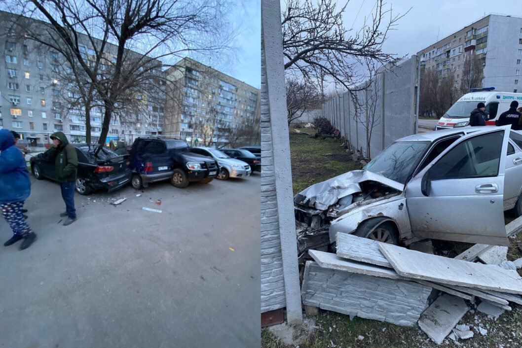 П’яний та без прав: у Дніпрі водій протаранив припарковані автівки та зніс паркан
